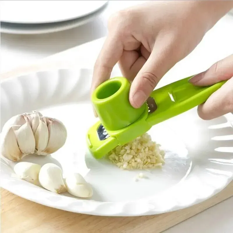Kitchen Gadgets Green - 1 Stück Mini-Knoblauchzerkleinerer Kreative Knoblauchpresse Manueller
